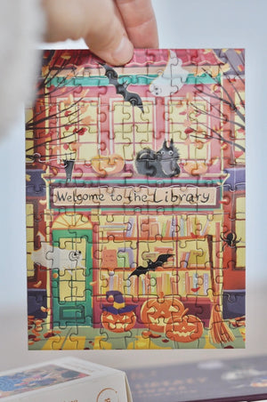 Halloween at the Library Puzzle Advent Calendar - Casse-tête de 13x99 pièces